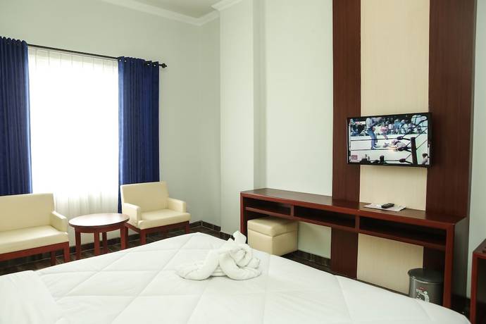 Imagen de la habitación del Hotel Tosan Solo Baru. Foto 9