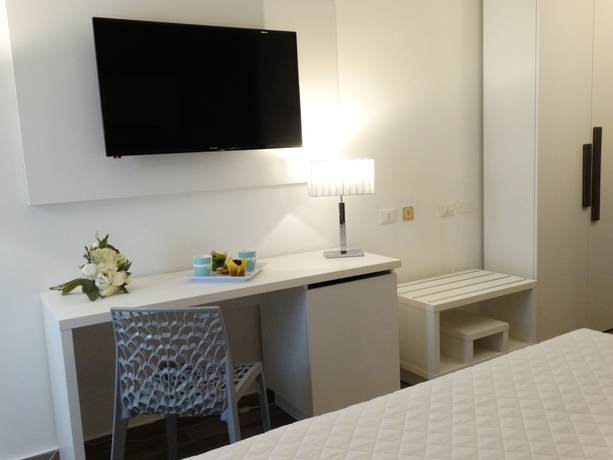 Imagen de la habitación del Hotel Toscana Ambassador. Foto 4