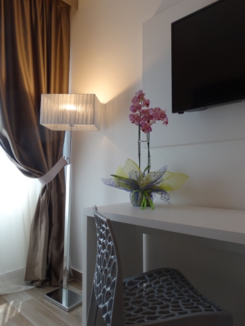 Imagen de la habitación del Hotel Toscana Ambassador. Foto 6