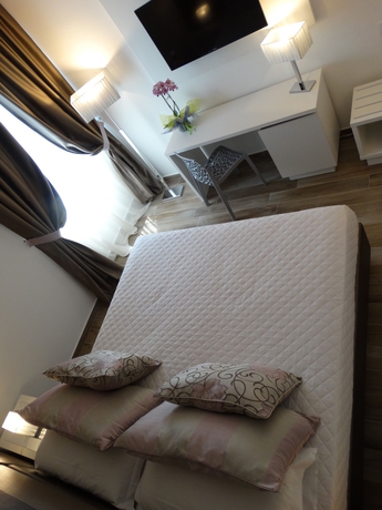 Imagen de la habitación del Hotel Toscana Ambassador. Foto 7