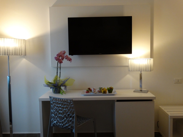 Imagen de la habitación del Hotel Toscana Ambassador. Foto 8