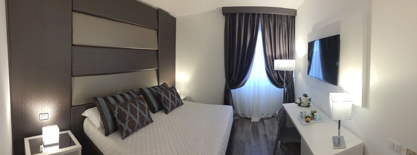 Imagen de la habitación del Hotel Toscana Ambassador. Foto 12