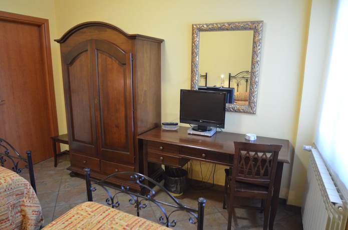 Imagen de la habitación del Hotel Toscano. Foto 2