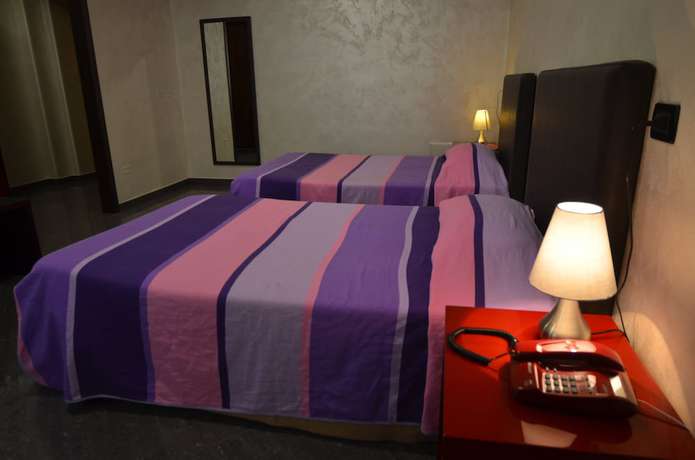 Imagen de la habitación del Hotel Toscano. Foto 14