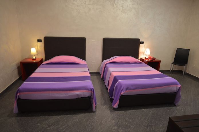 Imagen de la habitación del Hotel Toscano. Foto 16