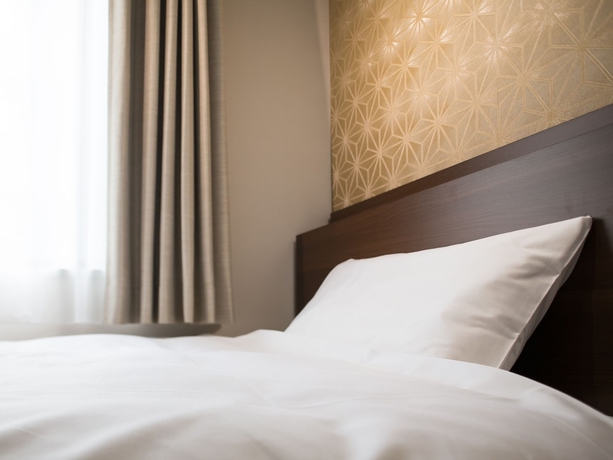 Imagen de la habitación del Hotel Tosei Cocone Kanda. Foto 3