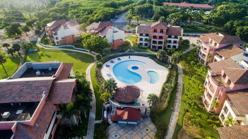 Imagen de la piscina del Hotel Tot Punta Cana Apartments. Foto 18