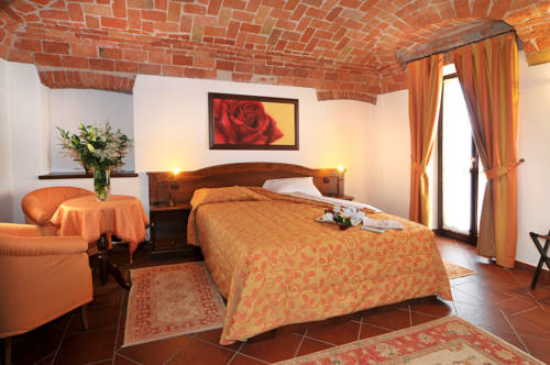 Imagen de la habitación del Hotel Tota Virginia Antico Podere. Foto 4