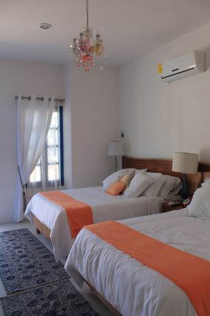 Imagen de la habitación del Hotel Toto Blue Boutique. Foto 6