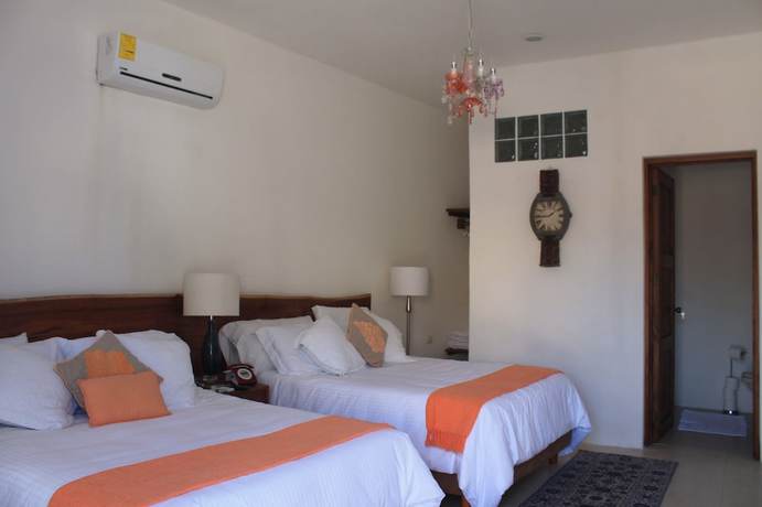 Imagen de la habitación del Hotel Toto Blue Boutique. Foto 10