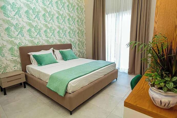 Imagen de la habitación del Hotel Toto Boutique. Foto 18
