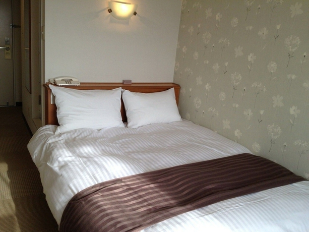 Imagen de la habitación del Hotel Tottori City. Foto 2