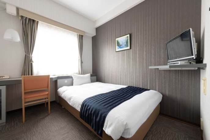 Imagen de la habitación del Hotel Tottori City. Foto 5