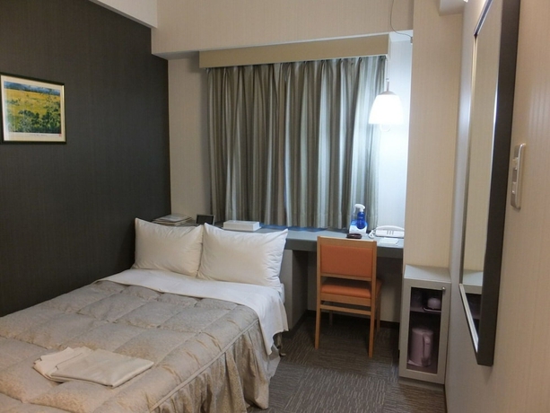 Imagen de la habitación del Hotel Tottori City. Foto 7