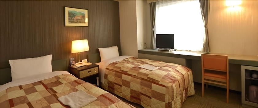 Imagen de la habitación del Hotel Tottori City. Foto 14