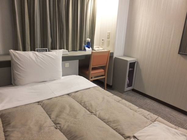 Imagen de la habitación del Hotel Tottori City. Foto 16