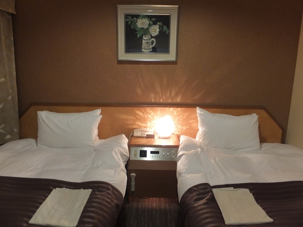Imagen de la habitación del Hotel Tottori City. Foto 17