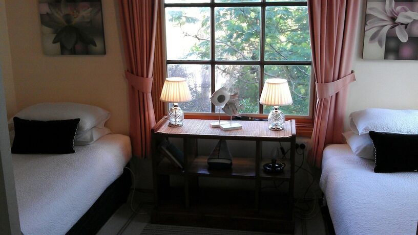 Imagen de la habitación del Hotel Touchwood Cottages. Foto 13