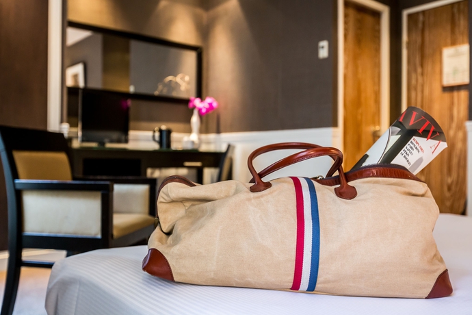 Imagen de la habitación del Hotel Toujours. Foto 11