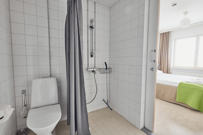 Imagen de la habitación del Hotel Töölö Towers. Foto 11