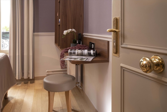 Imagen de la habitación del Hotel Tour Eiffel. Foto 9