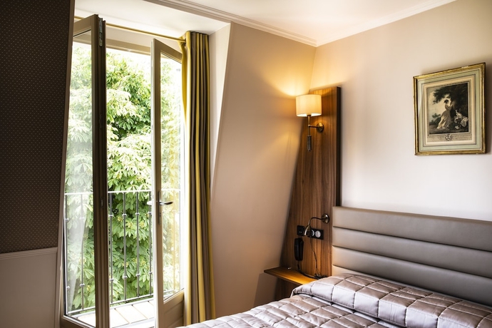 Imagen de la habitación del Hotel Tour Eiffel. Foto 10