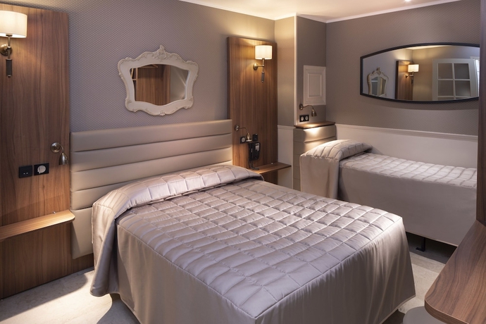 Imagen de la habitación del Hotel Tour Eiffel. Foto 12