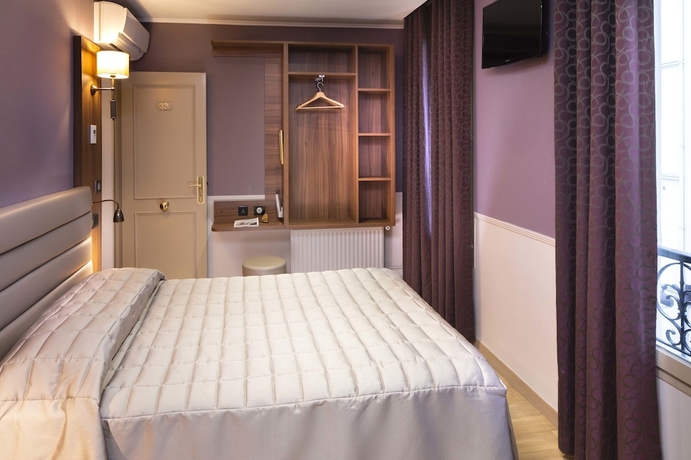 Imagen de la habitación del Hotel Tour Eiffel. Foto 13