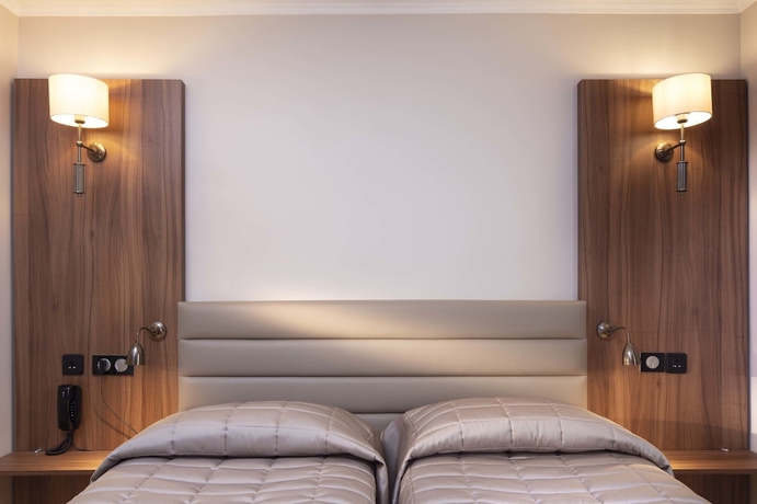 Imagen de la habitación del Hotel Tour Eiffel. Foto 15