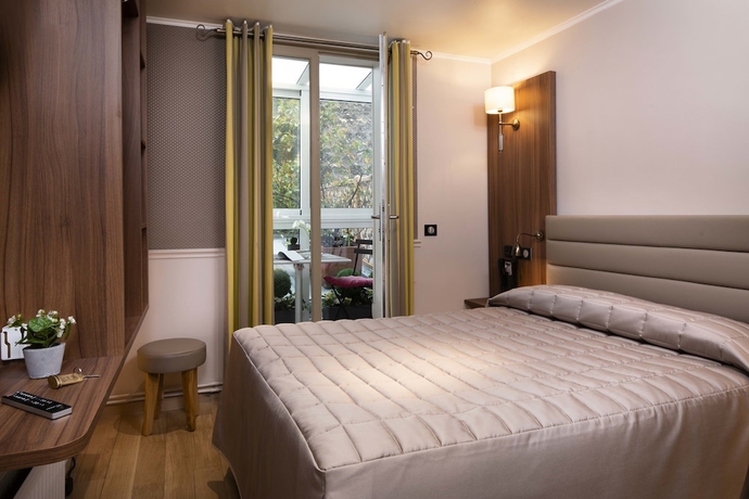 Imagen de la habitación del Hotel Tour Eiffel. Foto 16