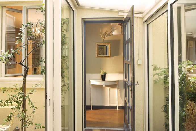 Imagen de la habitación del Hotel Tour Eiffel. Foto 18