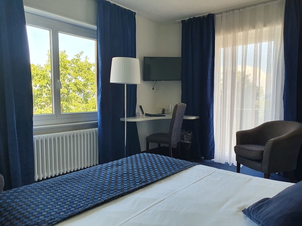 Imagen de la habitación del Hotel Touring Au Lac. Foto 11