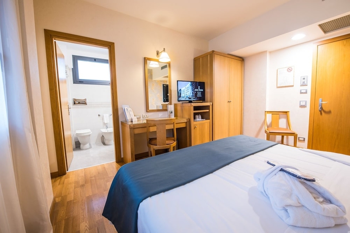 Imagen de la habitación del Hotel Touring, Carpi. Foto 2