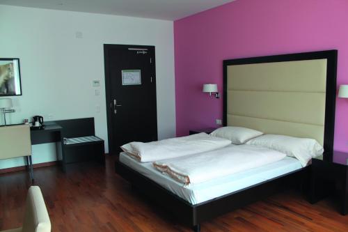 Imagen de la habitación del Hotel Touring Chiasso. Foto 8