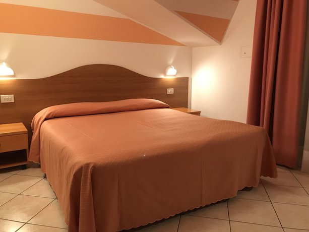 Imagen de la habitación del Hotel Touring, Lido Di Jesolo. Foto 16