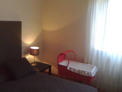 Imagen de la habitación del Hotel Touring, Livorno. Foto 6