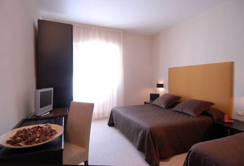 Imagen de la habitación del Hotel Touring, Livorno. Foto 10