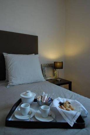 Imagen de la habitación del Hotel Touring, Livorno. Foto 14