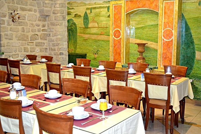 Imagen del bar/restaurante del Hotel Touring, Ópera. Foto 2