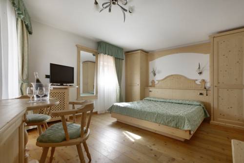 Imagen de la habitación del Hotel Touring, Predazzo. Foto 7