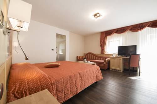 Imagen de la habitación del Hotel Touring, Predazzo. Foto 9