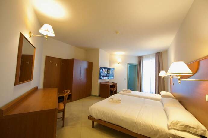 Imagen de la habitación del Hotel Touring, Seniga. Foto 16