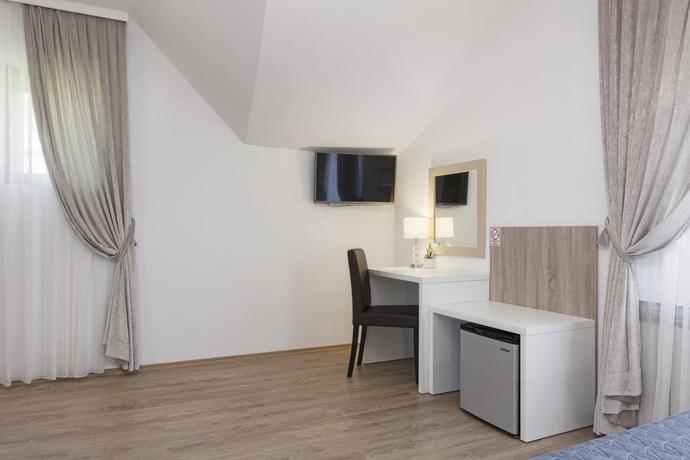 Imagen de la habitación del Hotel Tourist Center Marko. Foto 5