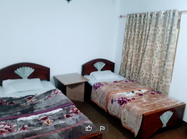 Imagen de la habitación del Hotel Tourist Cottage Hunza. Foto 13