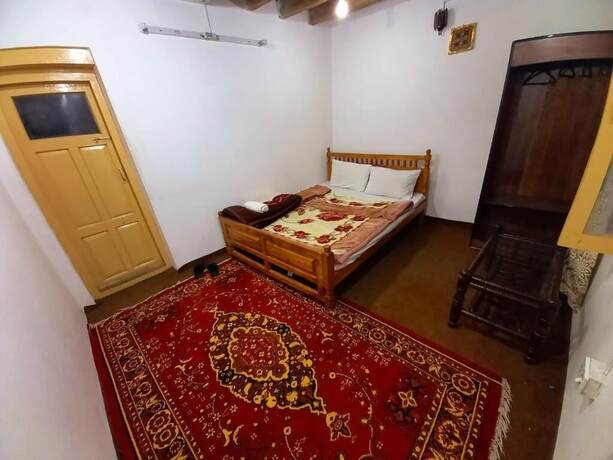 Imagen de la habitación del Hotel Tourist Cottage Hunza. Foto 14