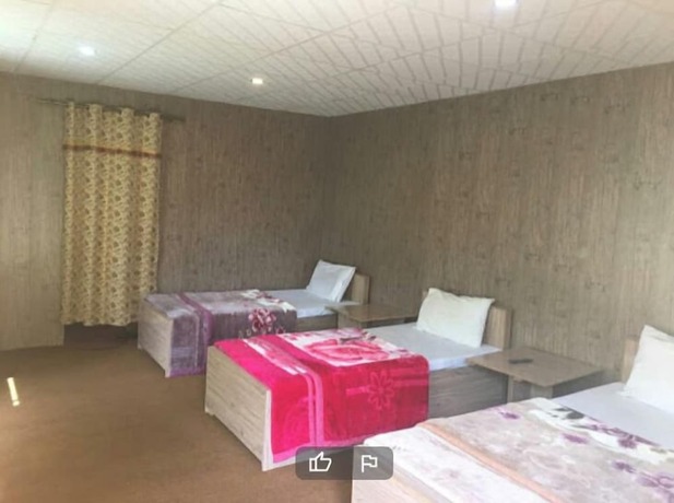 Imagen de la habitación del Hotel Tourist Cottage Hunza. Foto 15