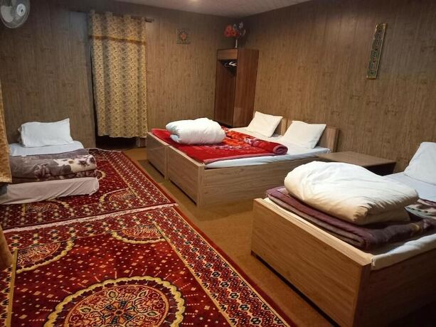 Imagen de la habitación del Hotel Tourist Cottage Hunza. Foto 19