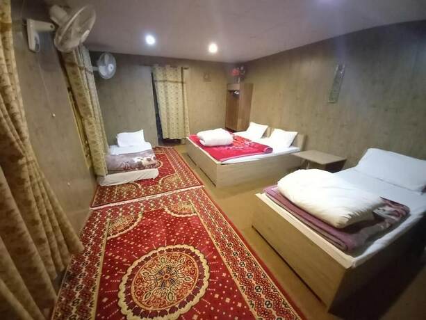 Imagen de la habitación del Hotel Tourist Cottage Hunza. Foto 20