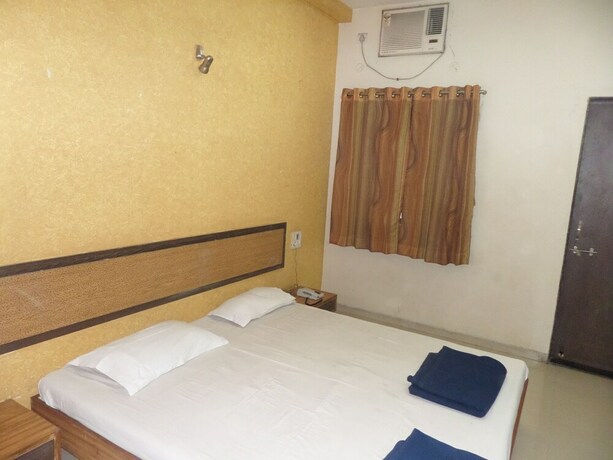 Imagen de la habitación del Hotel Tourist Home Lodging. Foto 16