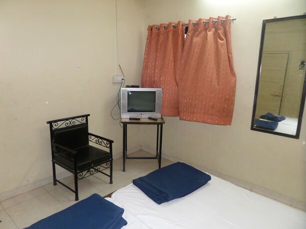 Imagen de la habitación del Hotel Tourist Home Lodging. Foto 18